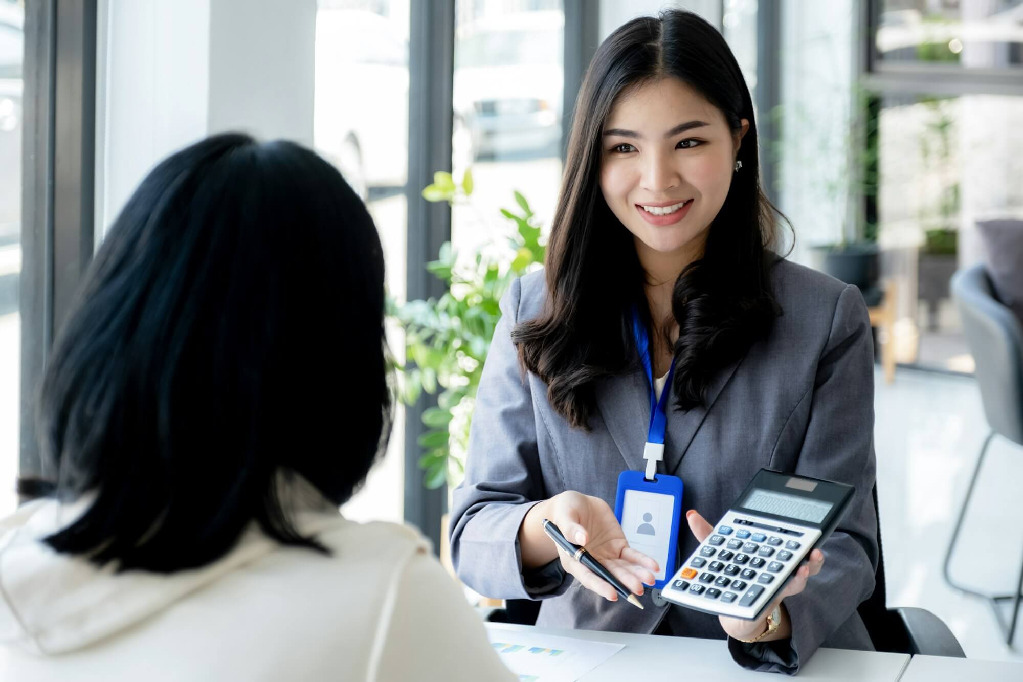 salesperson-presents-a-product-service-travel-savings-finance-investment-or-life-insurance.jpg